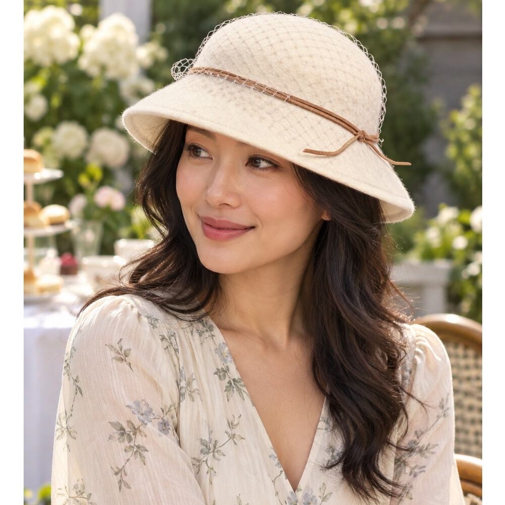 Justine Labeled Cream Cloche Style Hat with Netting and Brown Tie